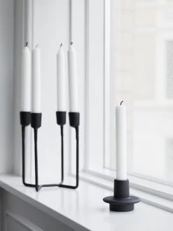 Normann Copenhagen Heima 4 Armed Candlestick In Black 9 Normann Copenhagen Heima 4 Armed Candlestick In Black -Homewares Shop normann copenhagen heima 4armed candlestick candles heima candlestick